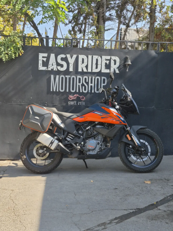 KTM 390 Adventure 2023 usada naranjo negro perfil lateral Easy Rider Motorshop Santiago