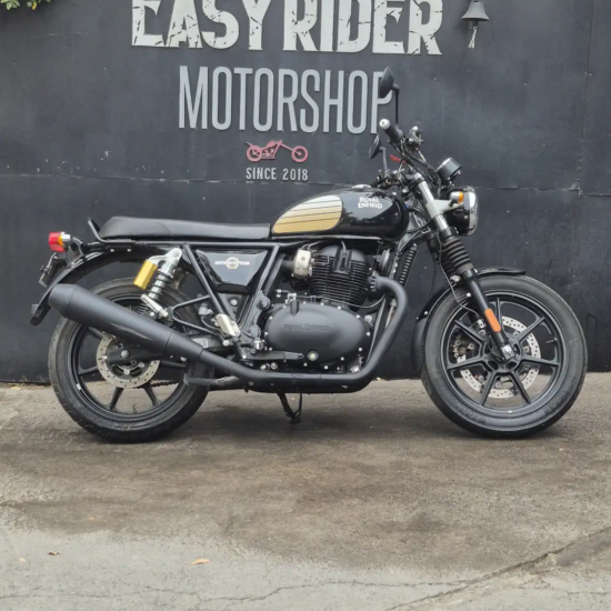 Royal Enfield Interceptor 650 usada 2025 color negro dorado, perfil lateral, Easy Rider Motorshop Santiago