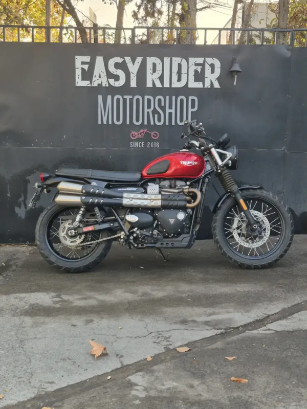 Triumph Street Scrambler usada 2021 roja perfil lateral Easy Rider Motorshop