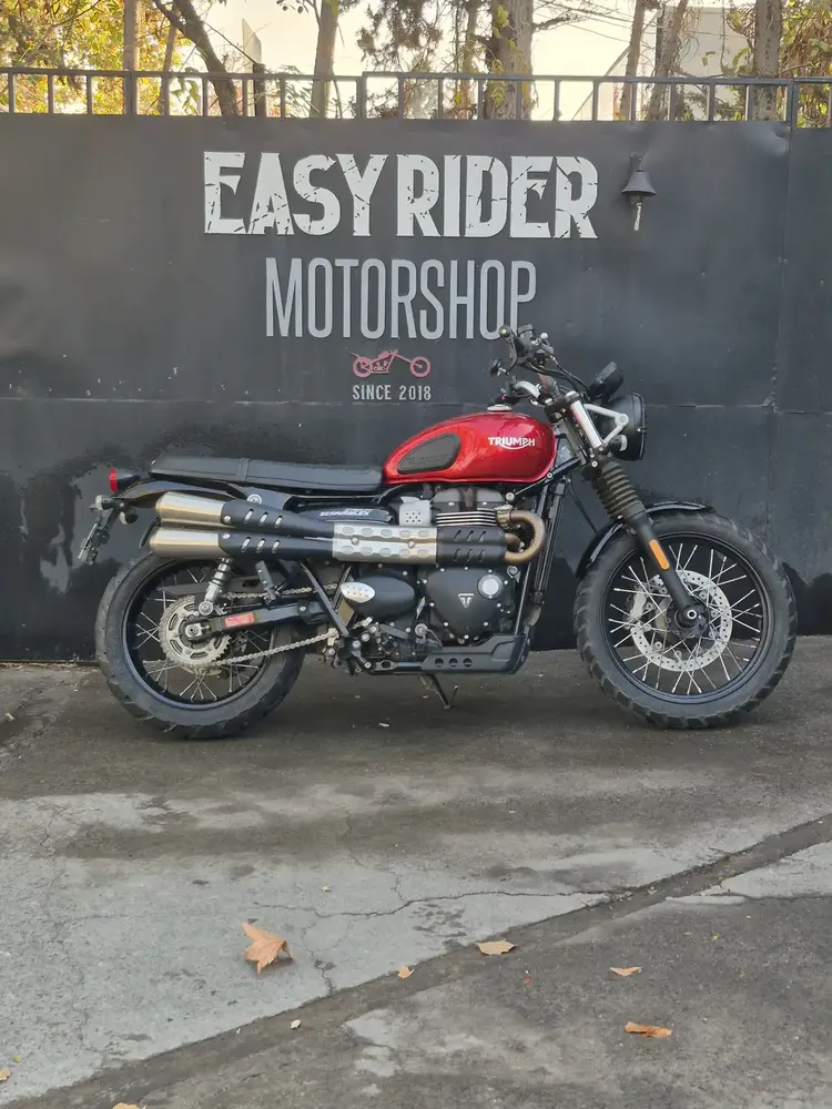 Triumph Street Scrambler usada 2021 roja perfil lateral Easy Rider Motorshop